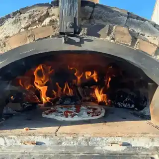 Wood-fired pizza oven at Fairmead Farm